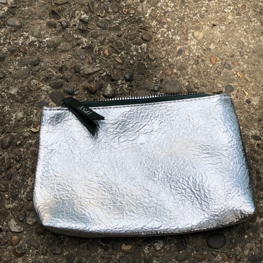 Make up bag. Silver. 8” x6”